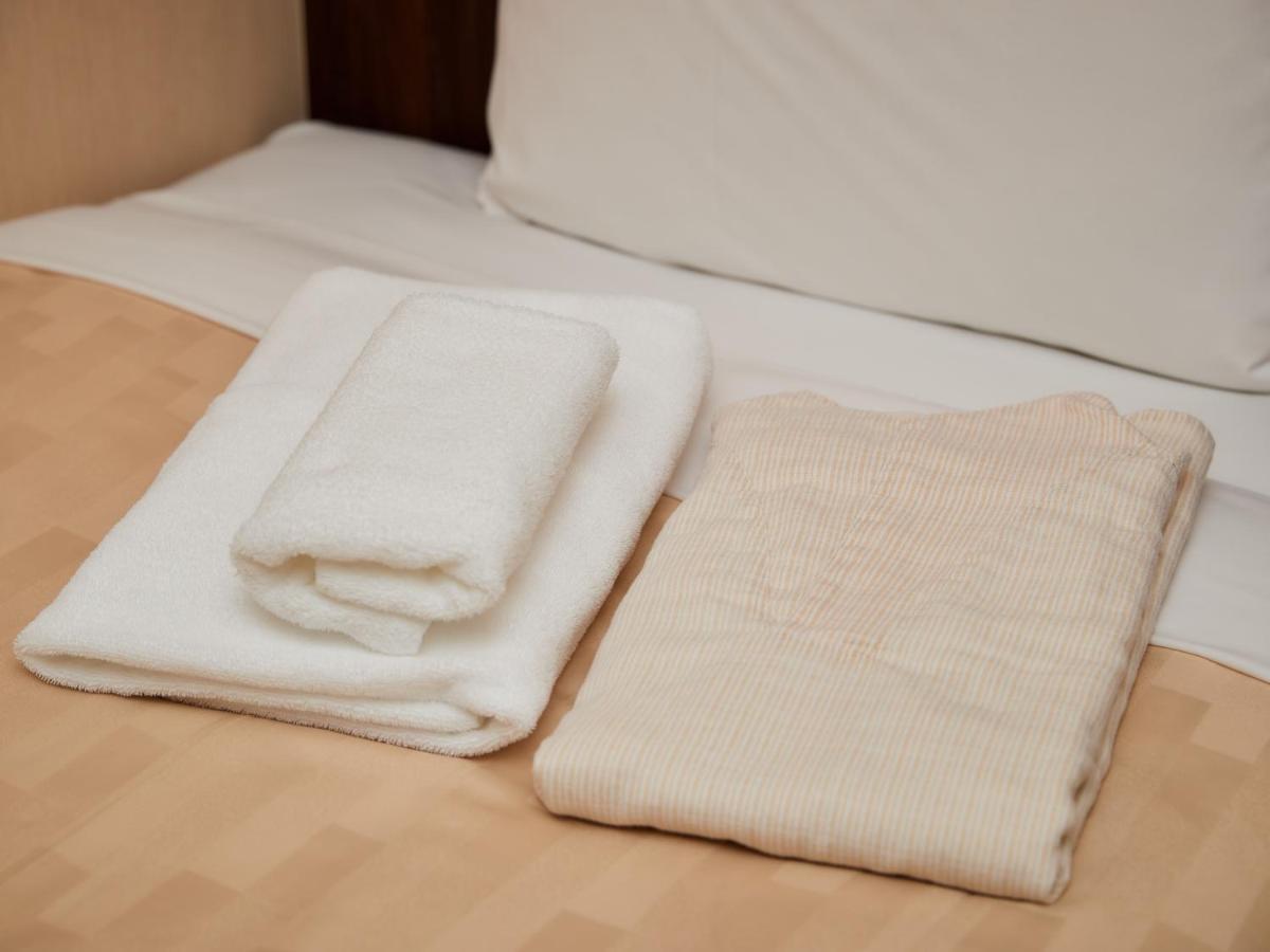 Grand Cabin Hotel Naha Oroku Buitenkant foto